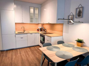Apart 555 New & Fully Equipped with Garage & 15 Min to City Center